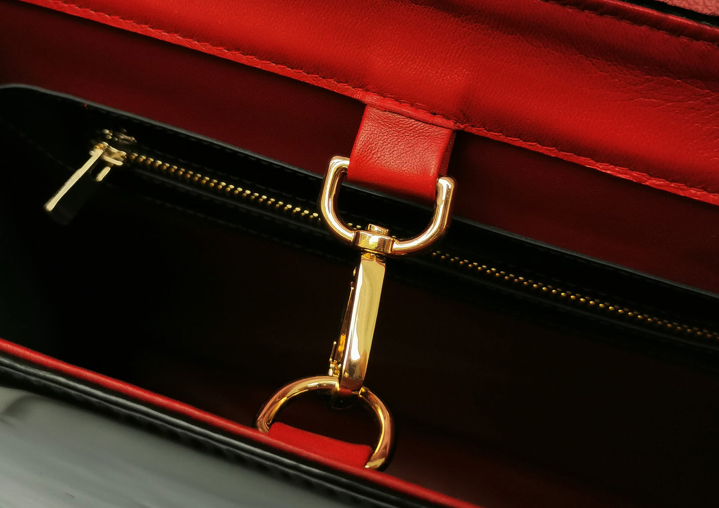 Elegant black handbag with python skin and pony leather details, handmade in Bucharest, Romania.