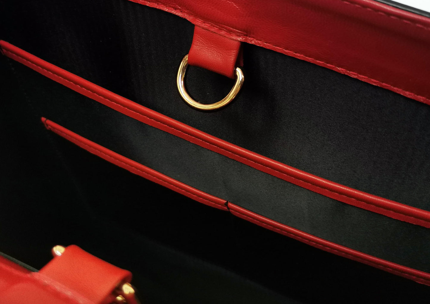 Elegant black handbag with python skin and pony leather details, handmade in Bucharest, Romania.