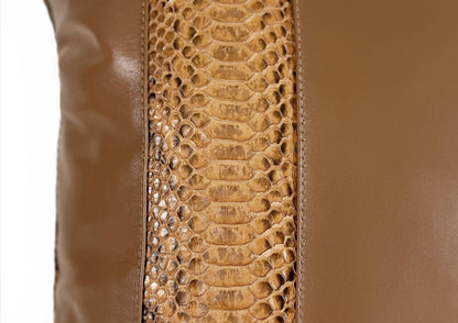 : Close-up of the Golden Sand goat leather texture from the Dune Large cushion.