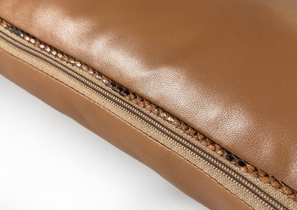 Close-up of the Mocha zipper on the Dune Large luxury cushion, crafted from Golden Sand goat leather and Sahara Python.