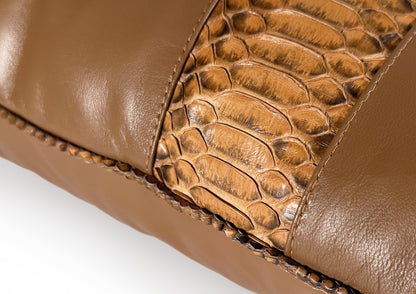 Hand stitching detail on the Dune Small cushion, showing precision and artisanal craftsmanship.