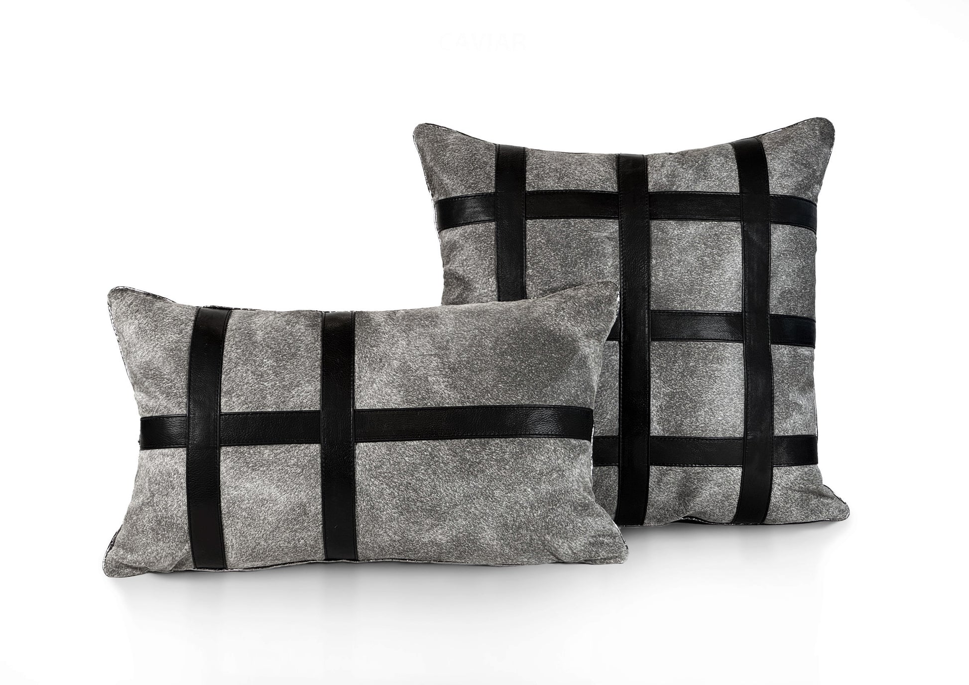Metropolitan Collection luxury cushions featuring the Stripe, Grid, and Square designs in grey hair-on-hide and black calf leather, handmade in Romania.