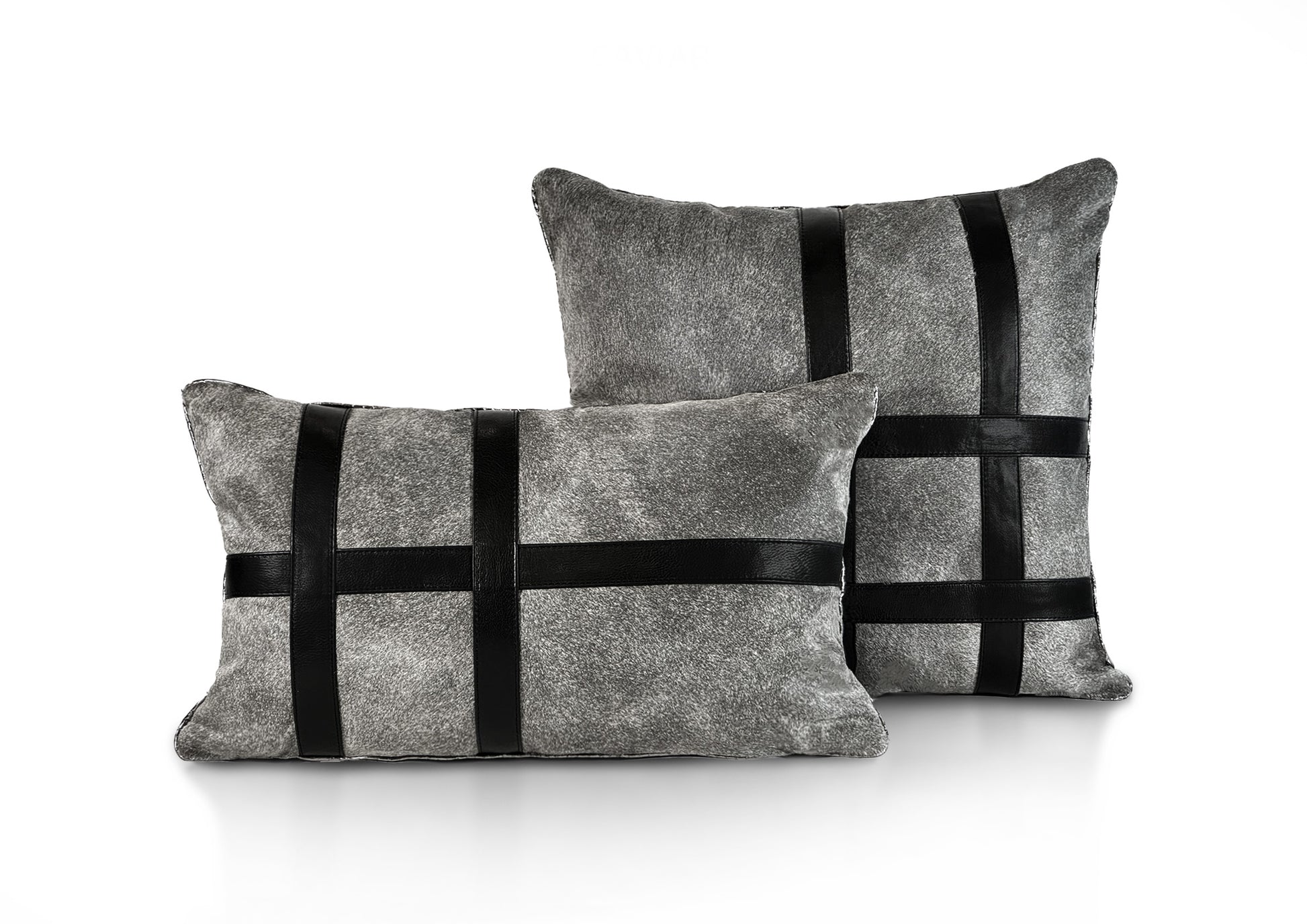 Metropolitan Collection luxury cushions featuring the Stripe and Grid designs in grey hair-on-hide and black calf leather, handmade in Romania.