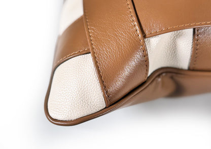 Fine hand stitching detail on the Terracotta Weave Small cushion, showing artisanal craftsmanship.