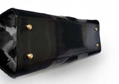 Elegant black handbag with python skin and pony leather details, handmade in Bucharest, Romania.