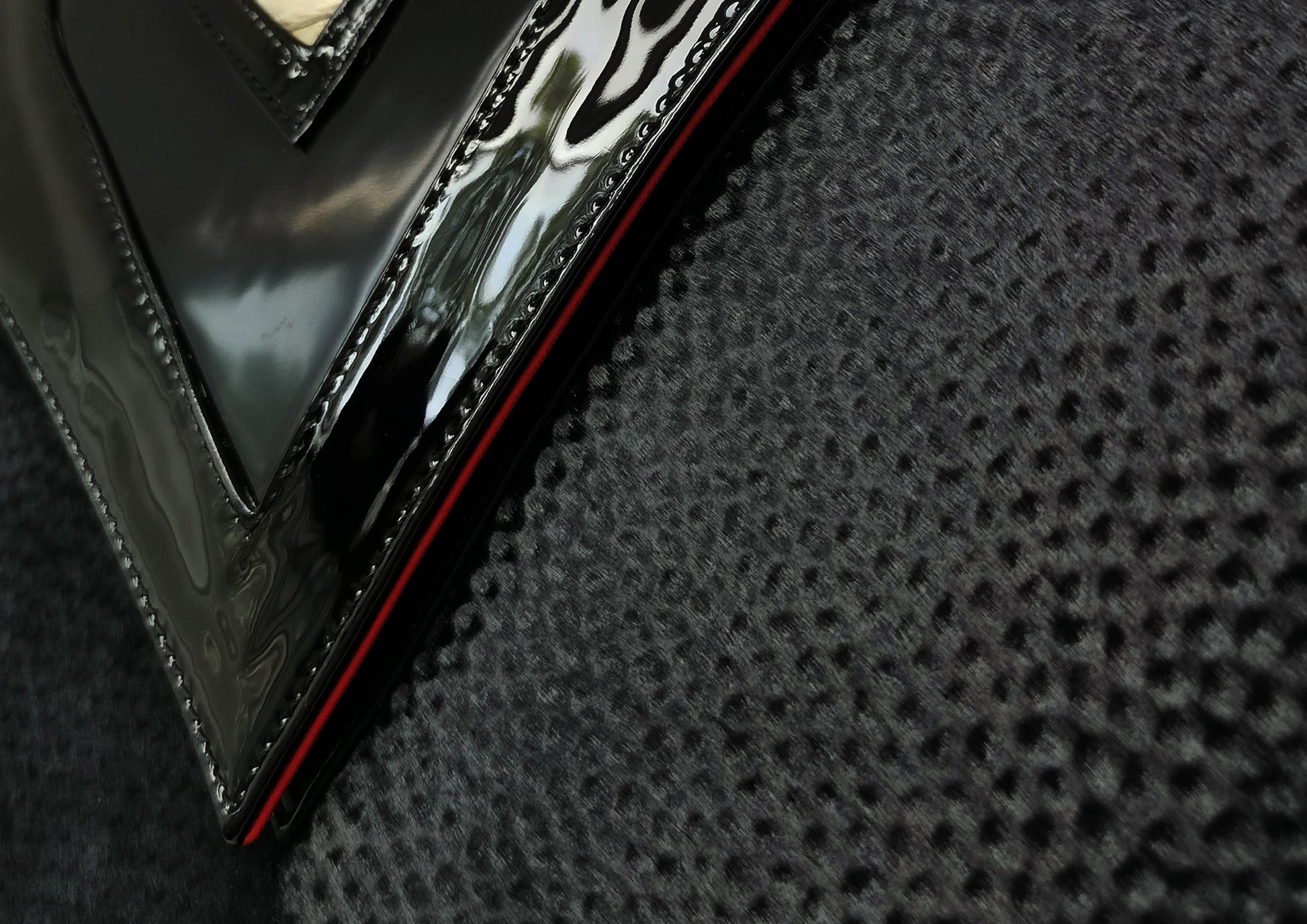 Elegant black handbag with python skin and pony leather details, handmade in Bucharest, Romania.