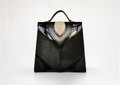 Elegant black handbag with python skin and pony leather details, handmade in Bucharest, Romania.