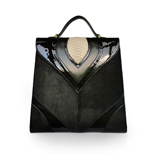 Elegant black handbag with python skin and pony leather details, handmade in Bucharest, Romania.